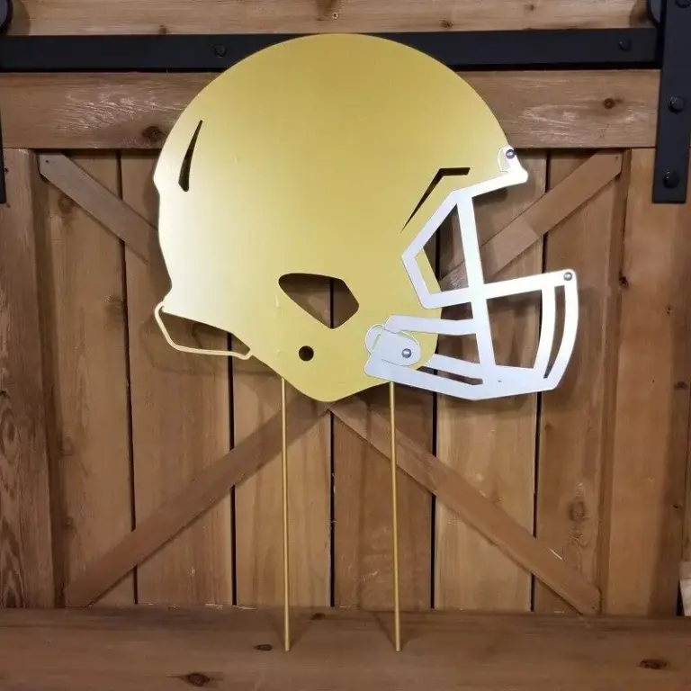 Notre dame football helmet on stakes